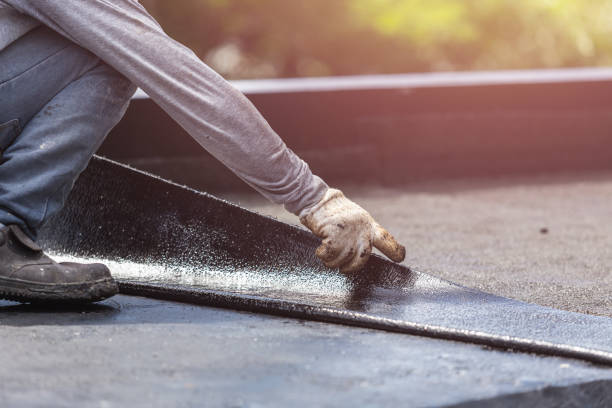 Professional Basement Waterproofing technician working in Washburn, IL